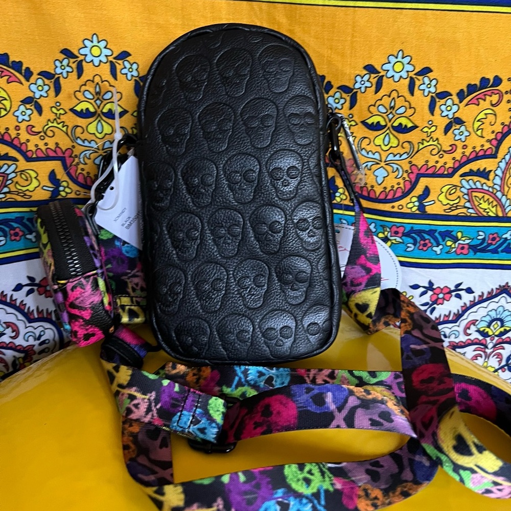 Betsy Johnson skull cross body with rainbow strap and removable coin purse